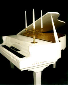 SG white piano w-candelabr.gif (22477 bytes)